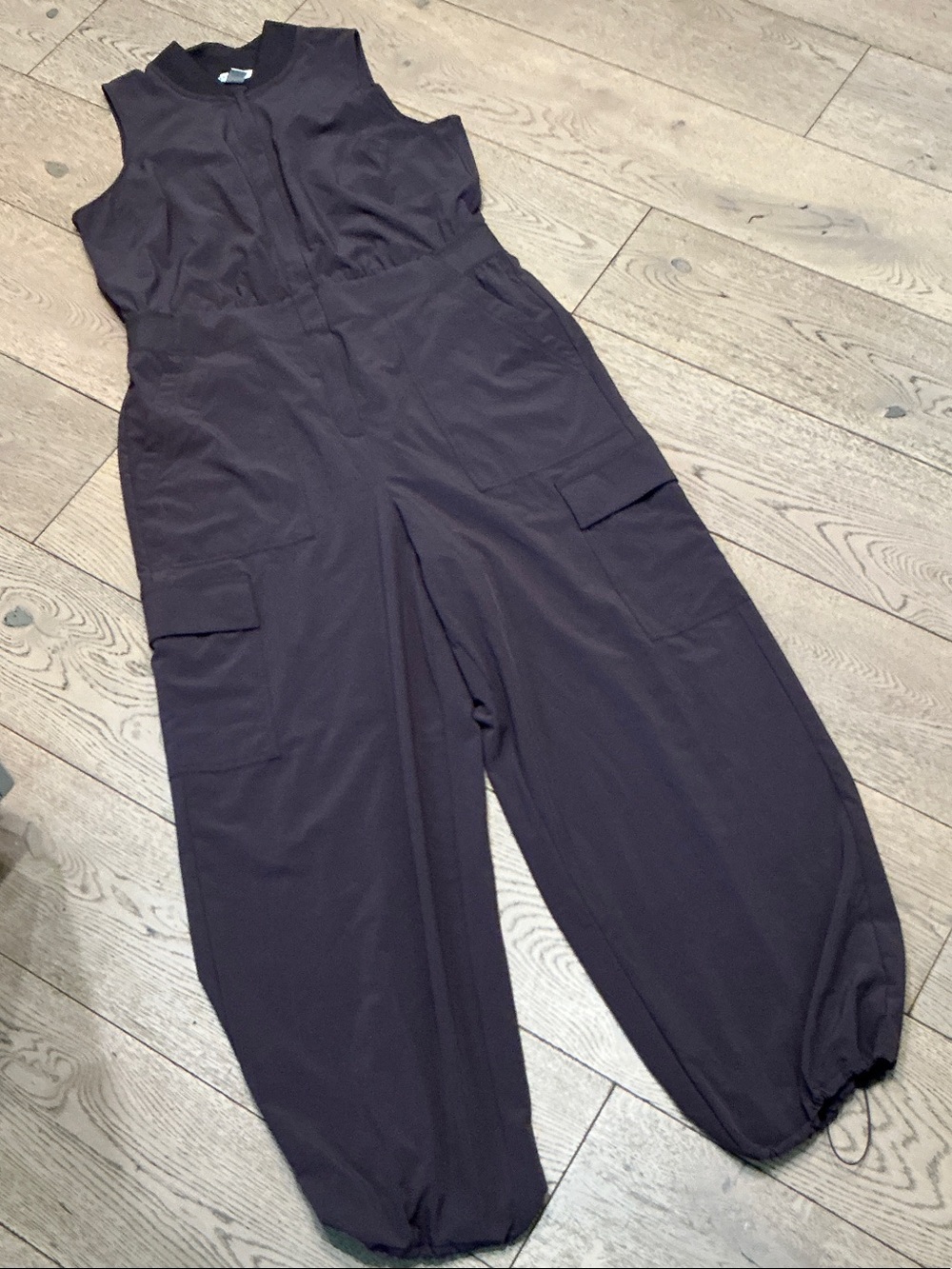 Woman’s Athleta brown sleeveless jumpsuit.size 14. Zip front. Pockets. Cargo.